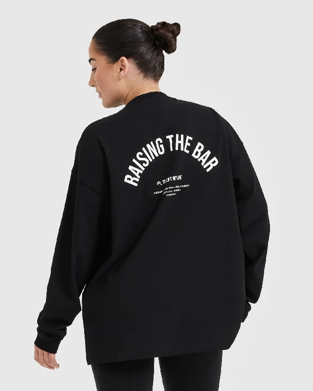 Raising The Bar Graphic Unisex Long Sleeve Top | Black