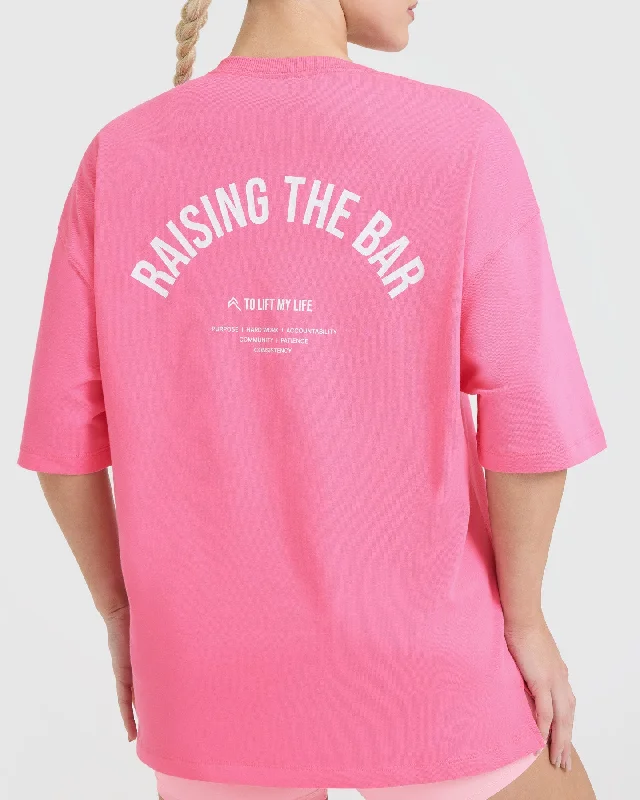 Raising The Bar Graphic Unisex T-Shirt | Peony Pink